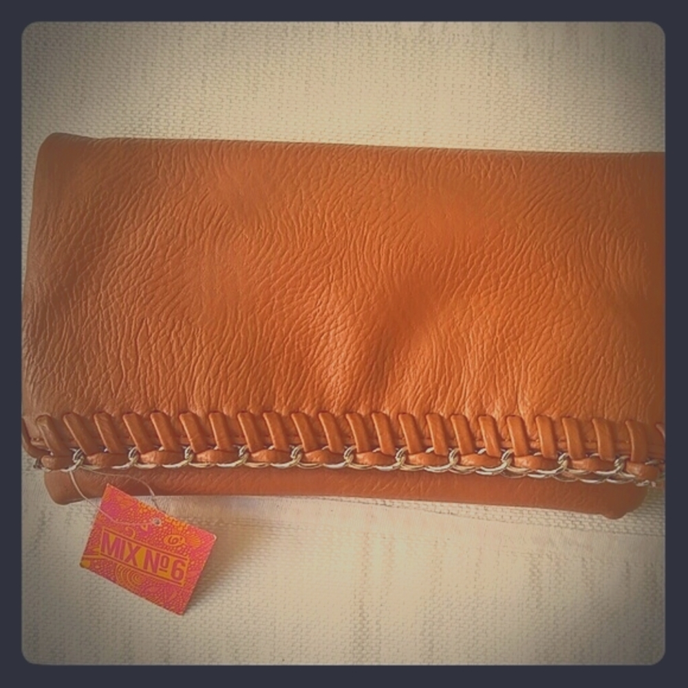 Caramel colored magnetic closure clutch